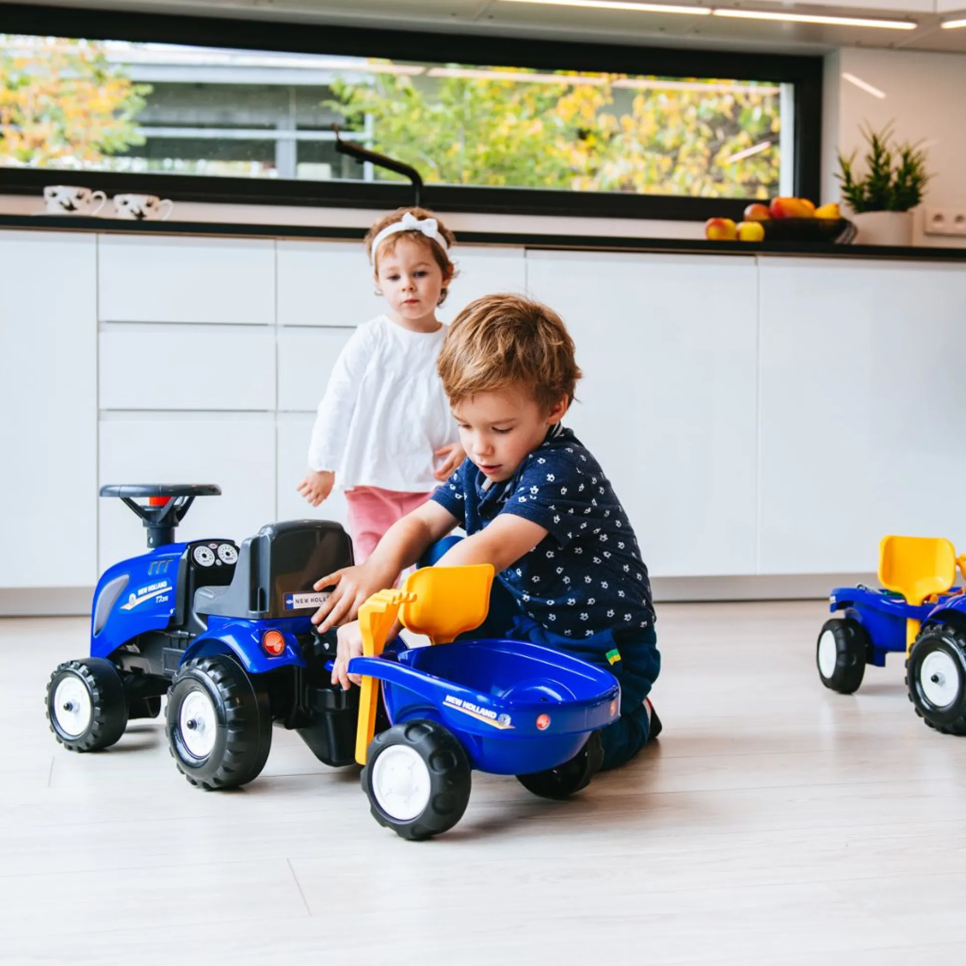 Falk New Holland Ride-on Tractor with Trailer, Rake & Shovel